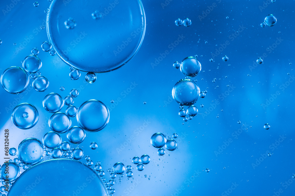 Abstract bubbles of oxygen floating towards the surface