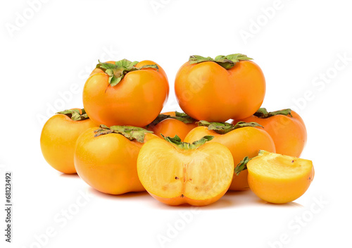 ripe persimmons isolated on white background