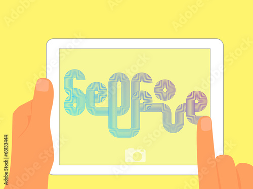 Graphic lettering of Selfie on tablet pc