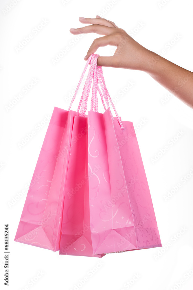 Woman hand holding gift bag