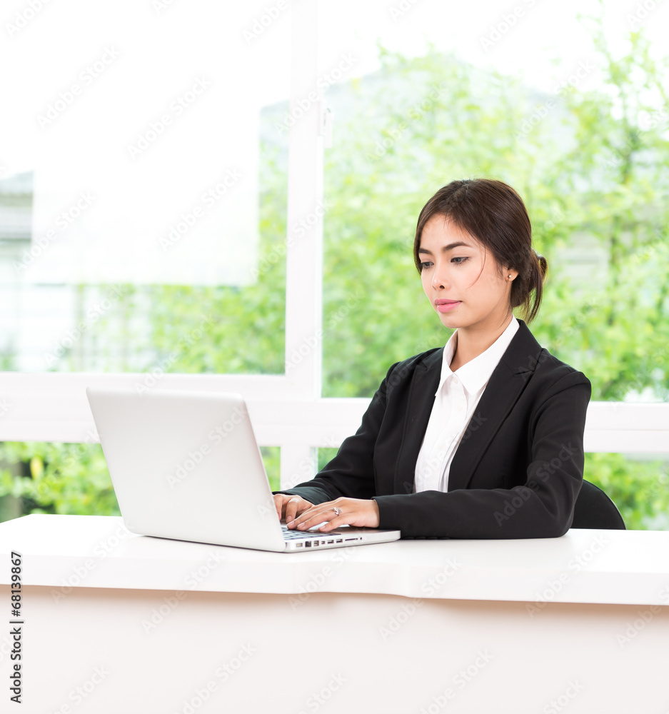 Business woman using computer laptop Business woman using computer laptop