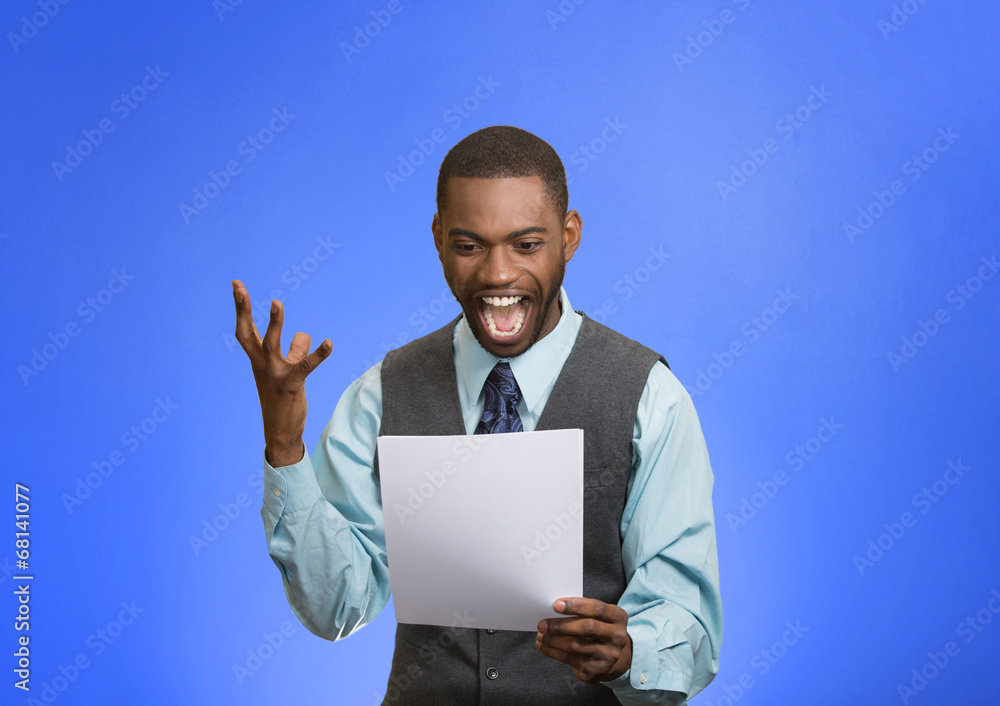 Happy man holding document, receiving good news blue background Happy man holding document, receiving good news blue background
