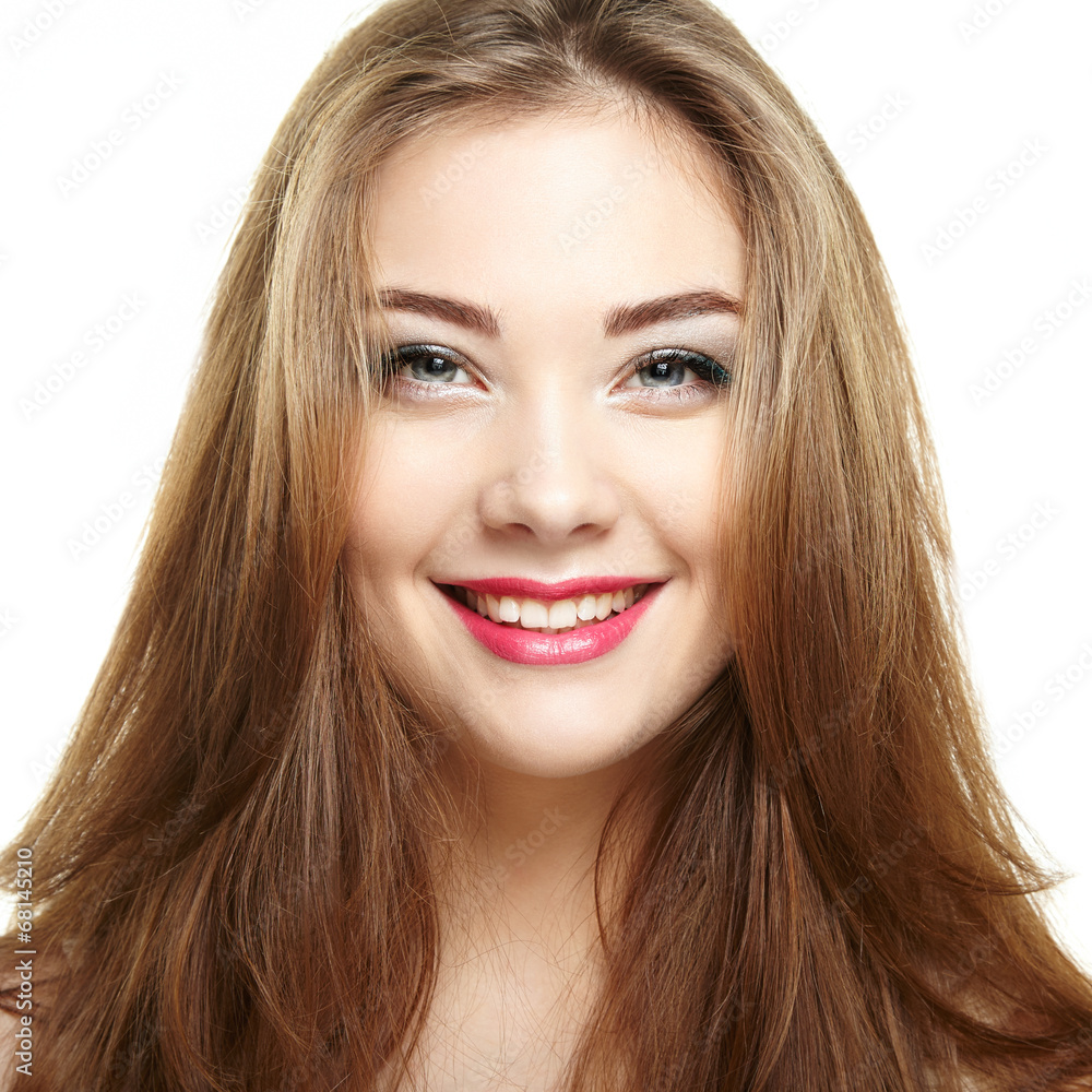 Beauty woman face. Young girl smiling. Isolated on white backgro Beauty woman face. Young girl smiling. Isolated on white backgro