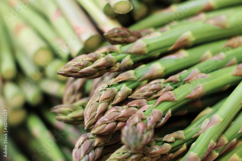 Φωτογραφία fresh asparagus loose in pile