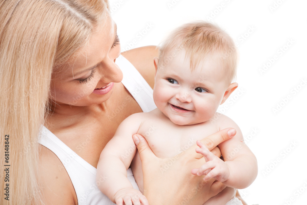 happy mother holding smiling infant. happy mother holding smiling infant.