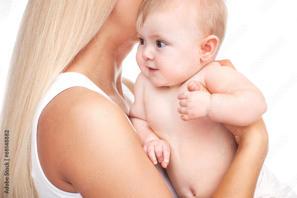 blond mother holding infant in hands. blond mother holding infant in hands.