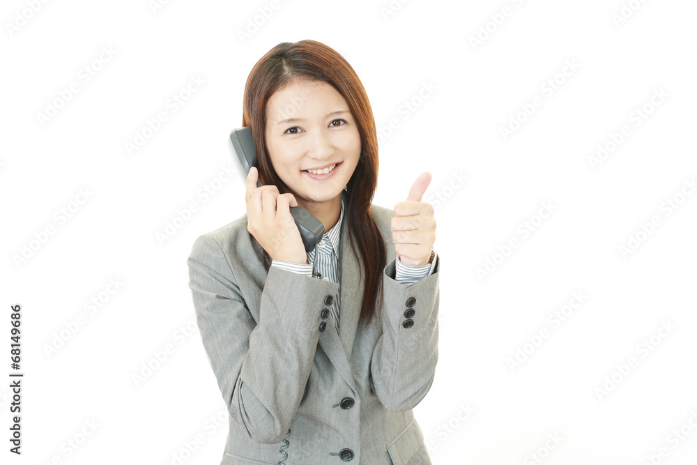 受話器を持つ女性 受話器を持つ女性