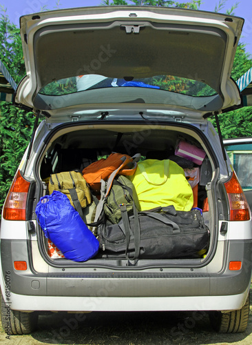 car full of luggage and suitcases for the summer holidays