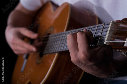 Man playing on guitar