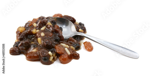 Heap of mincemeat mixture with a metal teaspoon