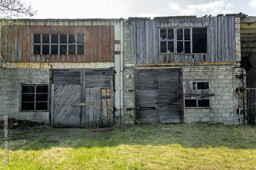 Abandoned and ruined garage photo