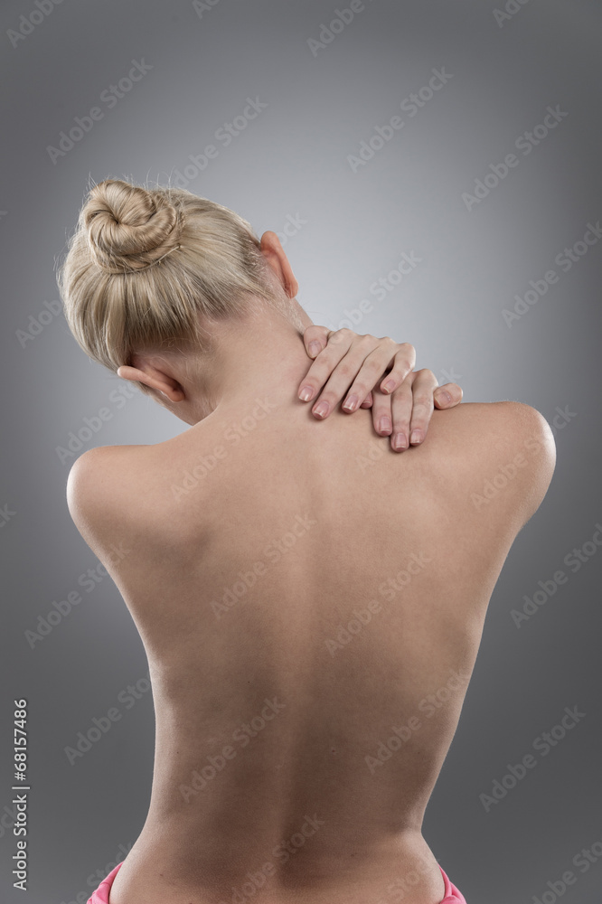 Woman massaging pain neck and back. Woman massaging pain neck and back.
