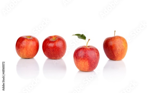 Apple which stands out from the crowd isolated