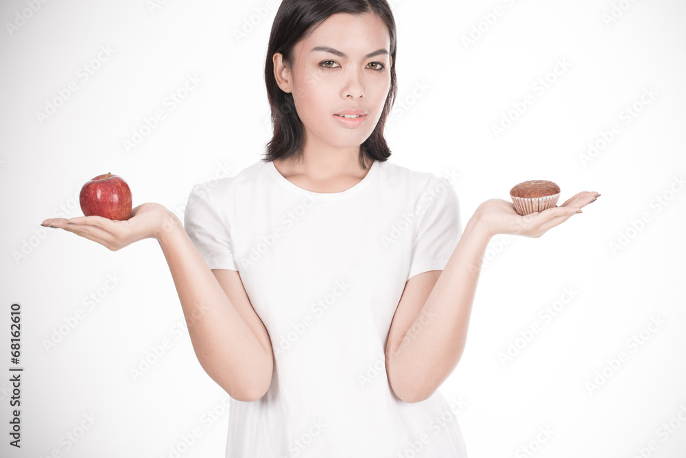 Smiling woman with apple isolated on white Smiling woman with apple isolated on white