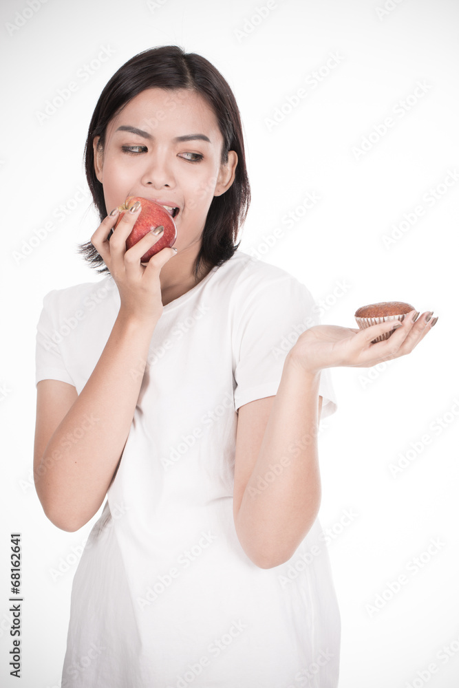 Smiling woman with apple isolated on white Smiling woman with apple isolated on white