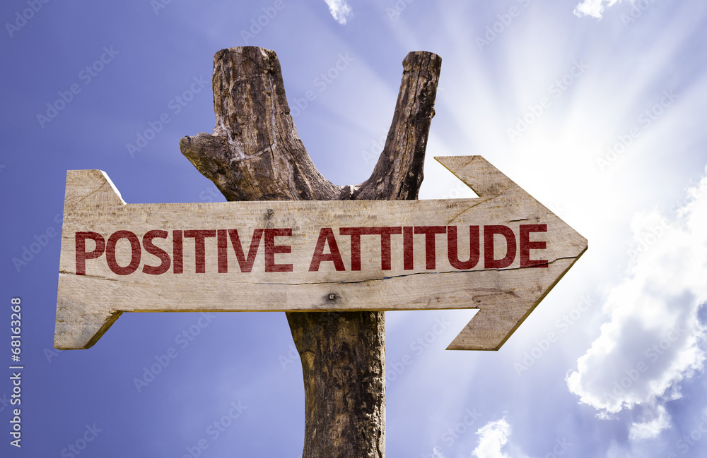 Positive Attitude wooden sign on a beautiful day