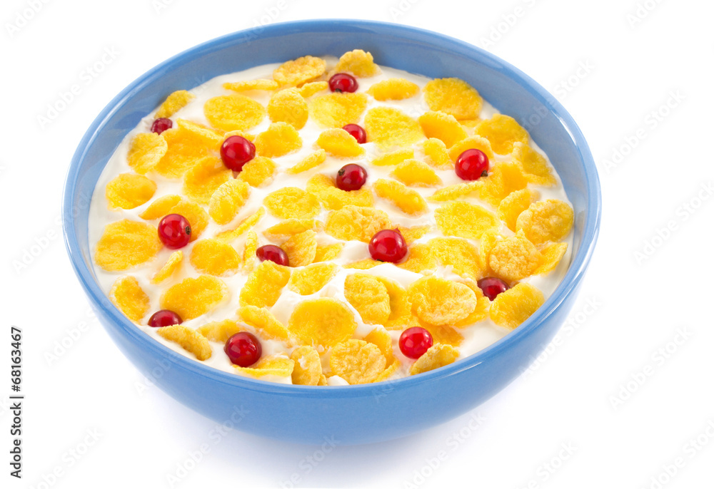 corn flakes and milk in bowl on white corn flakes and milk in bowl on white