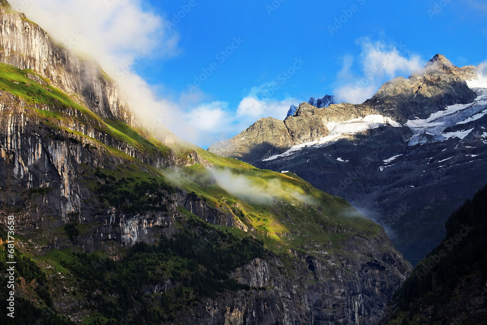 Wetterhorn Peak (3692m) over Grindelwald village, Switzerland