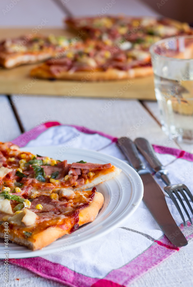 pizza with sausage, chicken, corn and cheese pizza with sausage, chicken, corn and cheese
