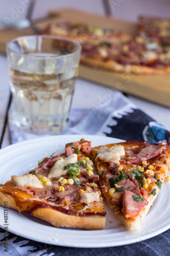 slices of pizza on a white plate