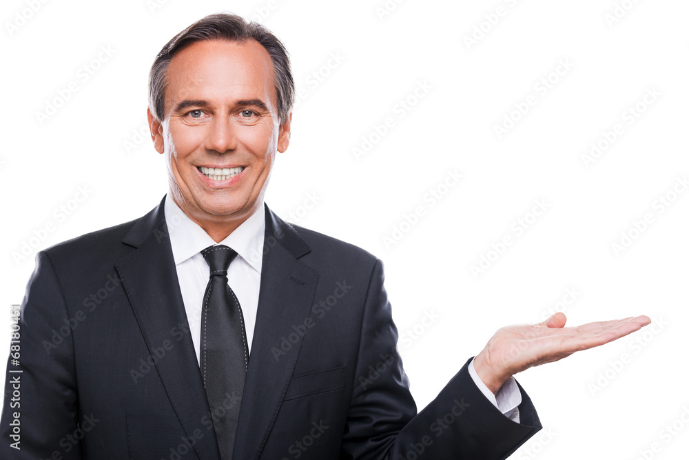 Businessman holding copy space. Businessman holding copy space.