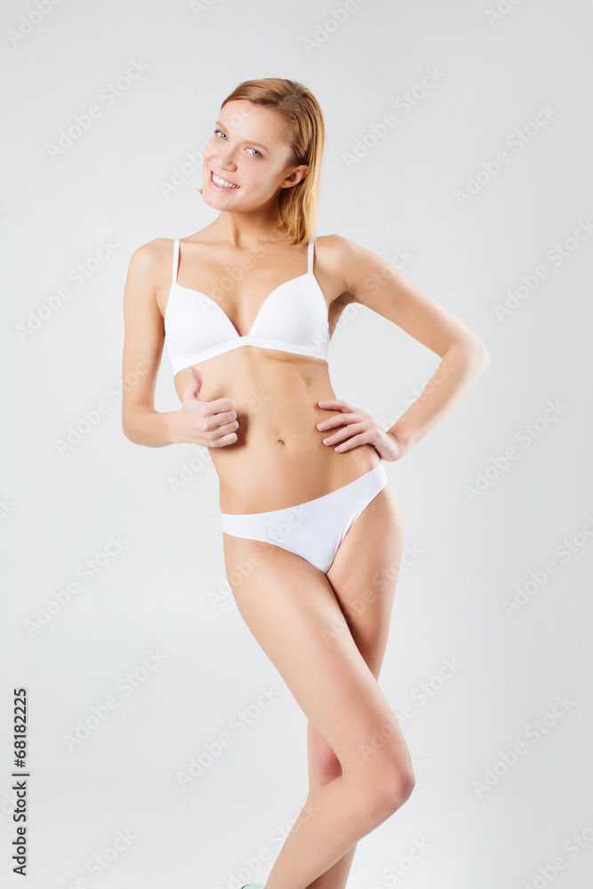 Fototapeta premium young athletic girl in white lingerie