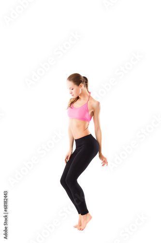 Sporty girl doing stretching exercises