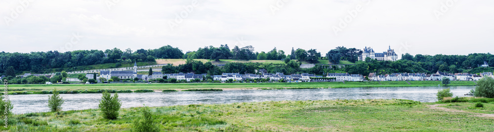 Panoramic view of medieval village over Loire river, France