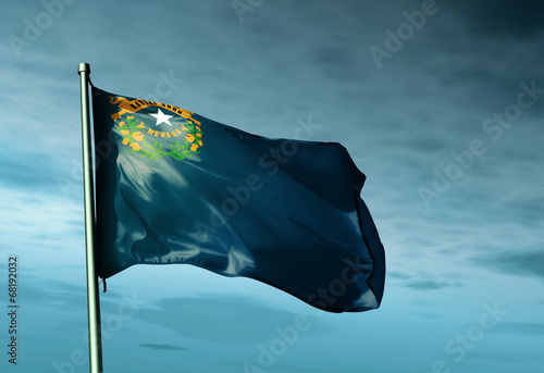 Photography Nevada (USA) flag waving on the wind