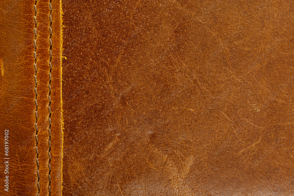 Fototapeta premium Brown leather texture closeup.