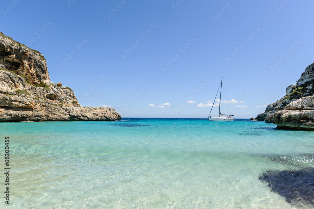 Sailing yacht on anchor in beautiful Mediterranean bay