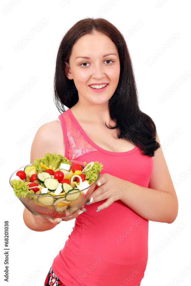 happy teenage girl holding dish with salad happy teenage girl holding dish with salad