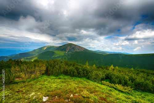 beautiful mountain landscape with dramatic clouds