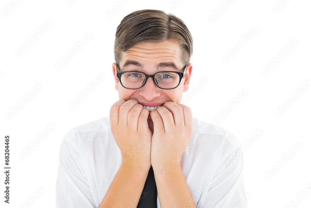 Geeky businessman looking nervously at camera Geeky businessman looking nervously at camera