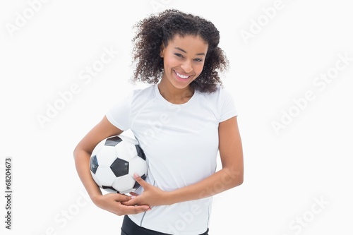 Pretty girl posing with her football © WavebreakMediaMicro