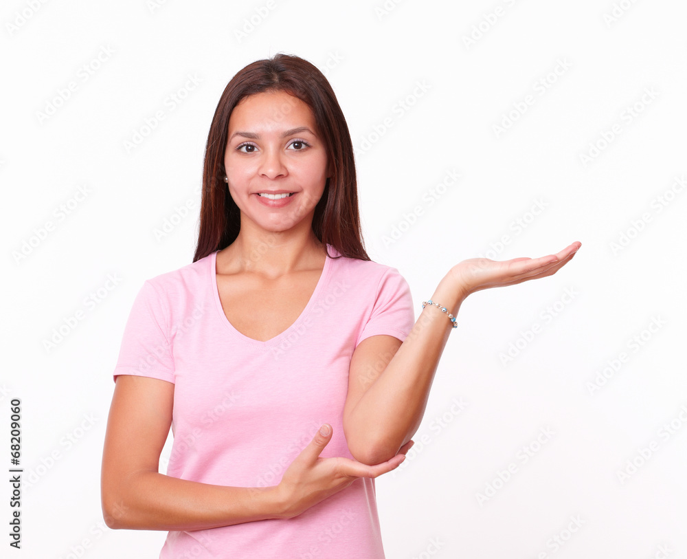 Alone hispanic girl holding up her left hand Alone hispanic girl holding up her left hand