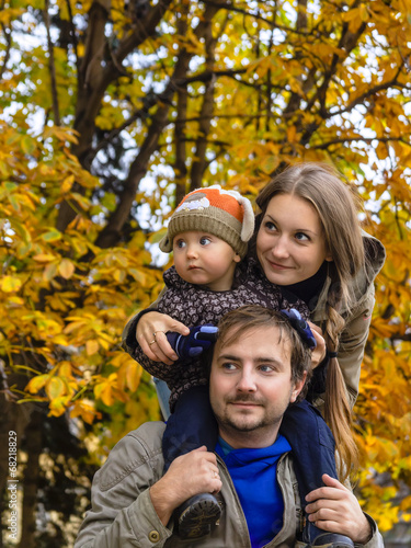 Family in autumn park look