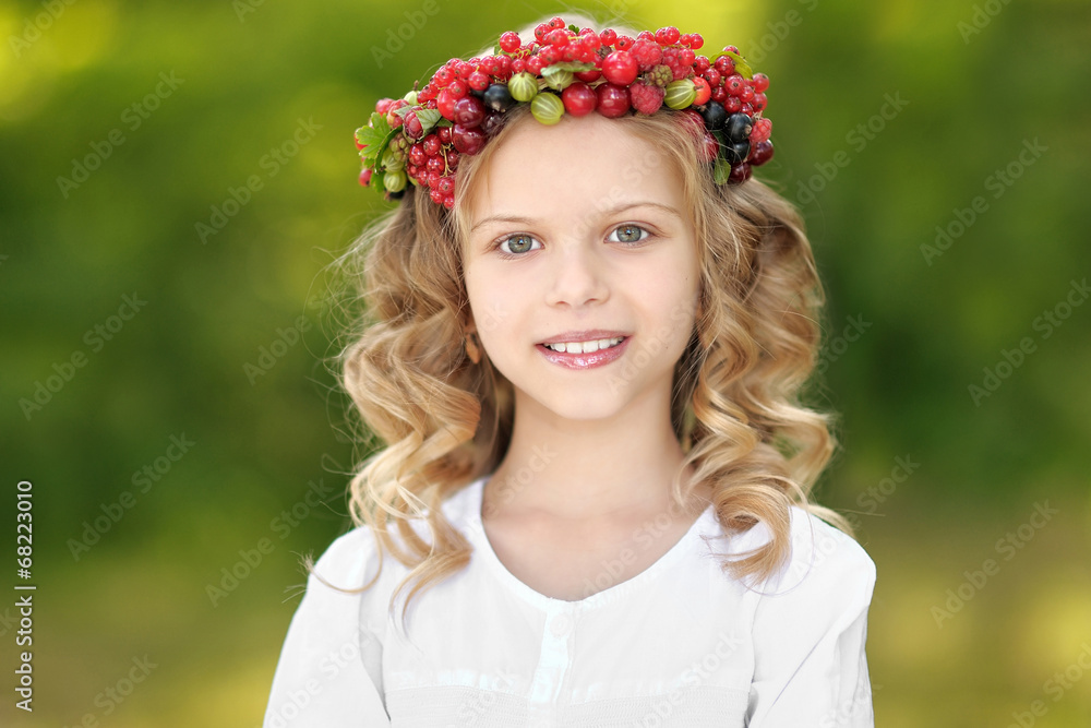 portrait of a beautiful little girl with berries portrait of a beautiful little girl with berries