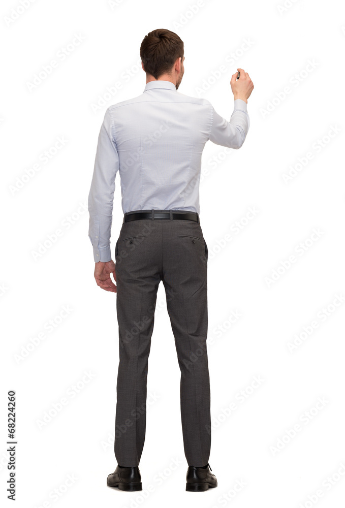 businessman or teacher with marker from back businessman or teacher with marker from back