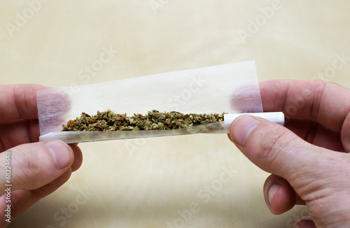 Rolling marijuana joint