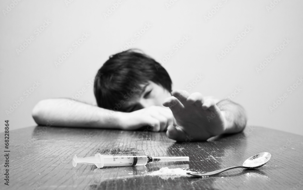 young addict pulls arm Drugs
