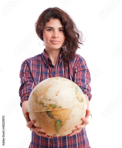 Dreamer girl holding a world globe photo