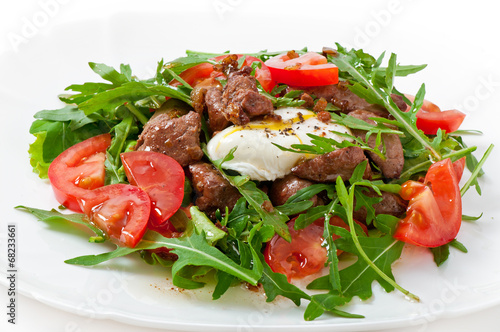 Mixed salad with chicken liver and egg Pochet