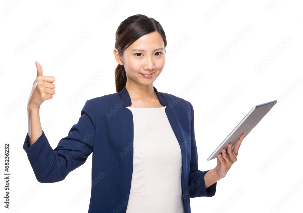 Woman thumb up with tablet Woman thumb up with tablet