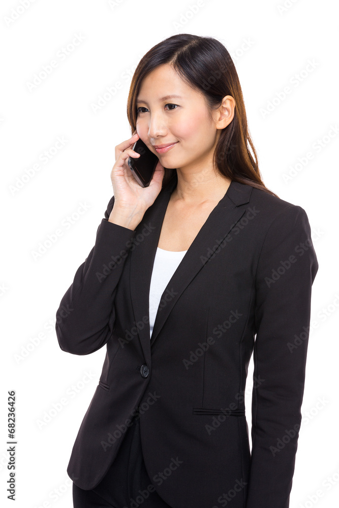 Businesswoman talk on mobile phone Businesswoman talk on mobile phone