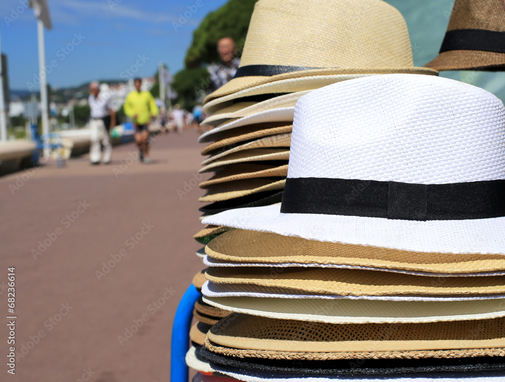 Hats laid out on the waterfront of the French Riviera