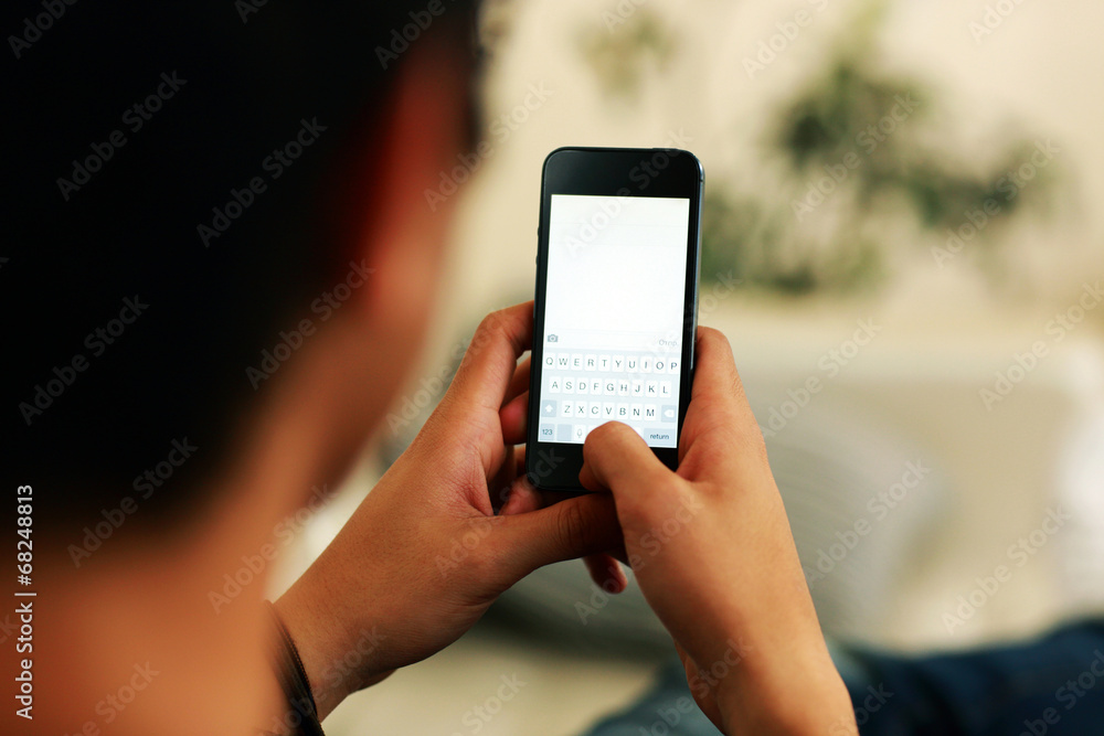 Closeup portrait of a man using smartphone Closeup portrait of a man using smartphone