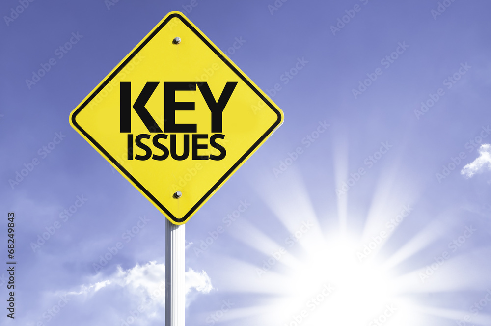 Key Issues road sign with sun background Key Issues road sign with sun background