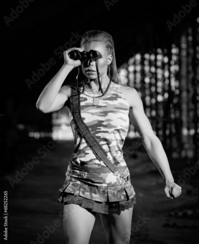 Woman in uniform with binoculars  monochrome version 