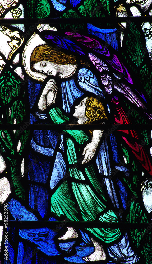 Angel guiding / helping a child in stained glass